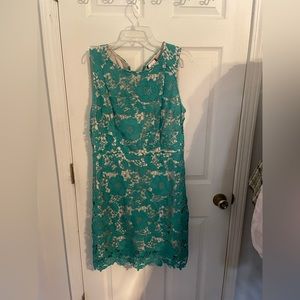 Trulli Dress. mint flowers pattern lace with a cream underneath.